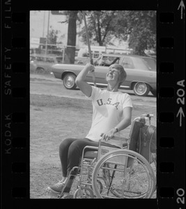 Bea Anderson, Olympic wheelchair champ from West Brookfield, with javelin at Boston's "Happening for the Handicapped" on Boston Common