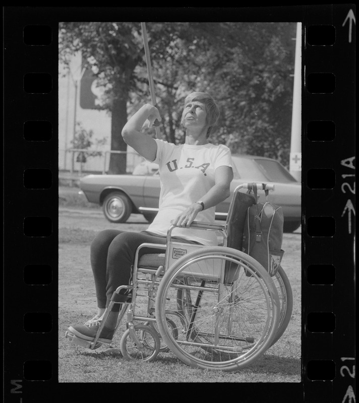 Bea Anderson, Olympic wheelchair champ from West Brookfield, with javelin at Boston's "Happening for the Handicapped" on Boston Common