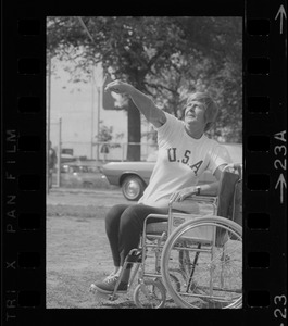 Bea Anderson, Olympic wheelchair champ from West Brookfield, with javelin at Boston's "Happening for the Handicapped" on Boston Common