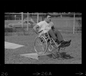 Unidentified man in wheelchair at Boston's "Happening for the Handicapped" on Boston Common