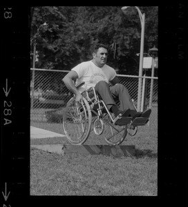 Unidentified man in wheelchair at Boston's "Happening for the Handicapped" on Boston Common