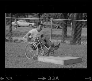 Unidentified man in wheelchair at Boston's "Happening for the Handicapped" on Boston Common