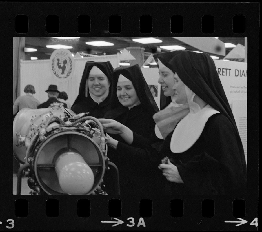 Nuns examining machinery at Winterfest