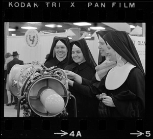 Nuns examining machinery at Winterfest