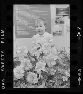 Girl with flower display at Winterfest