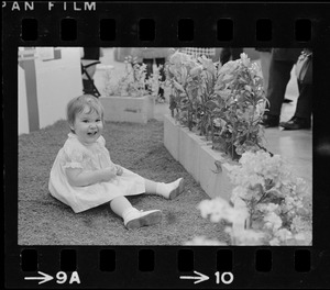 Girl with flower display at Winterfest