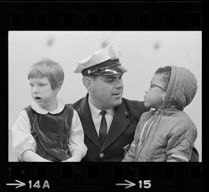 Police officer with two kids at Winterfest