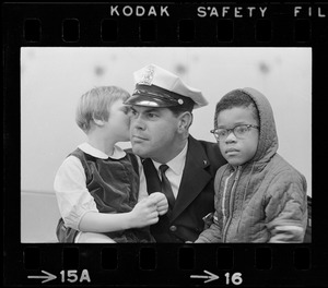 Police officer with two kids at Winterfest