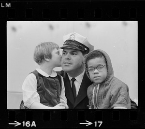 Police officer with two kids at Winterfest