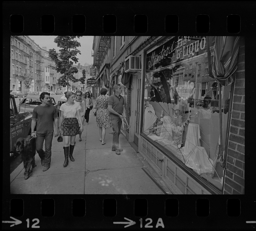 Broken window on Charles Street day after anti-Hippie violence