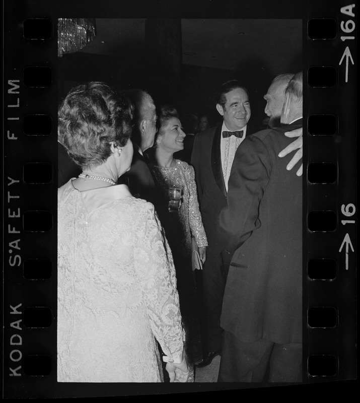 Iranian Princess Ashraf Pahlavi and Dr. Morris Abram speak with group of people at Brandeis University commencement banquet