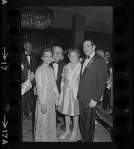 Iranian Princess Ashraf Pahlavi, two unidentified people, and Dr. Morris Abram at Brandeis University commencement banquet