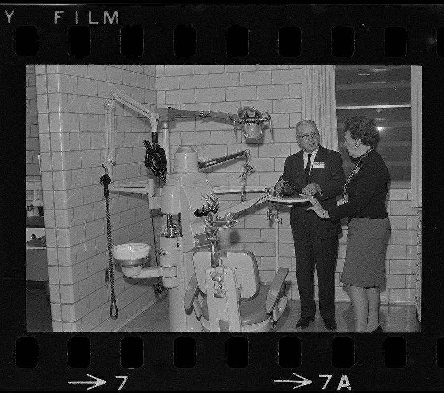 Supt. Mrs. Betty Cole Smith and an unidentified judge examine a dental chair at Mass. Women's Correctional Institution, Framingham