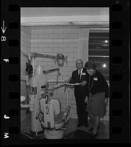 Supt. Mrs. Betty Cole Smith and an unidentified judge examine a dental chair at Mass. Women's Correctional Institution, Framingham