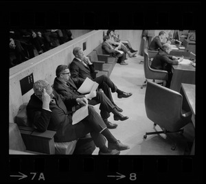 An unidentified man, John J. Craven, and Paul Tierney in Boston city council chamber for mayor's State of the City address