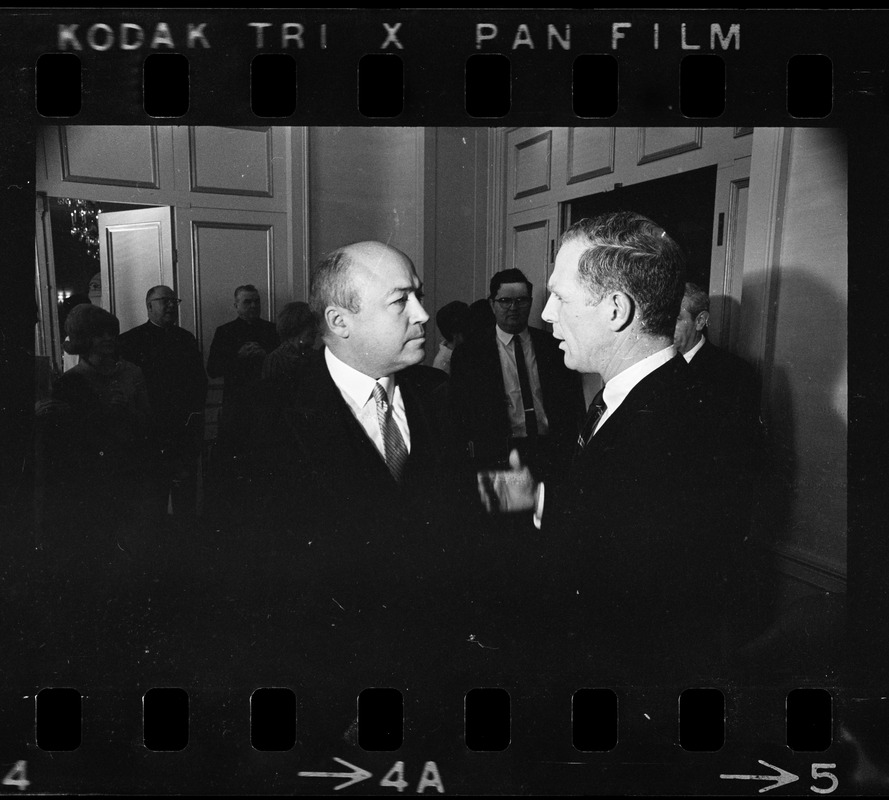 Boston Mayor Kevin White talking to unidentified man at inaugural luncheon