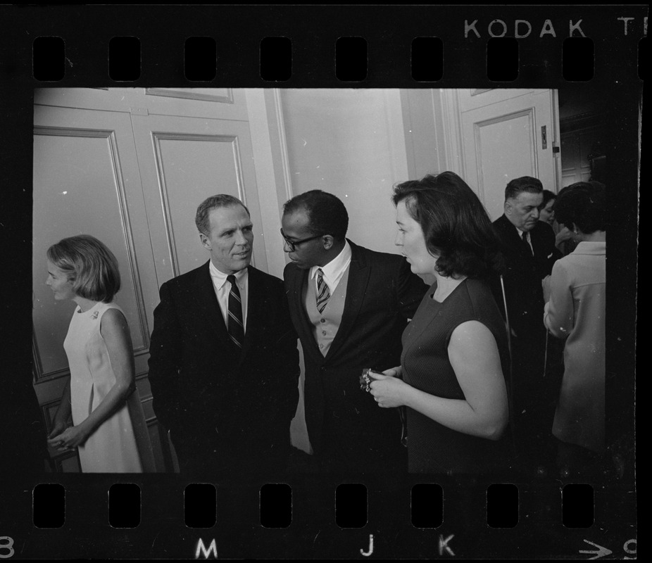 Boston Mayor Kevin White speaking with City Councilor and Mrs. Thomas Atkins at inaugural luncheon