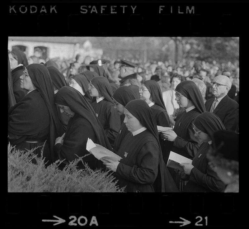 Nuns pray at Cardinal Cushing funeral, Milton