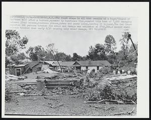 The front steps is all that remains of a Negro "Church of God" here 8/29 after a tornado, spawned by hurricane Cleo, smashed this town of 7,000 damaging between 35-40 houses, business places, trees and power lines, leaving 15 injured. The Red Cross reported 100 persons treated for shock and damage was estimated at $ 750,000. A second small tornado touched down early 8/30 causing only minor damage.