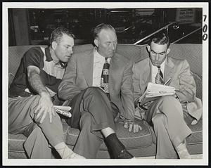 Indians Sharpen Up by working on a cross-word puzzle as they relax at the Hotel Kenmore awaiting tonight's game with the Red Sox at Fenway Park. Left to right, outfielder Dale Mitchell, Pitching Coach Red Ruffing and Outfielder Paul Lehner, who was obtained recently from the Browns.