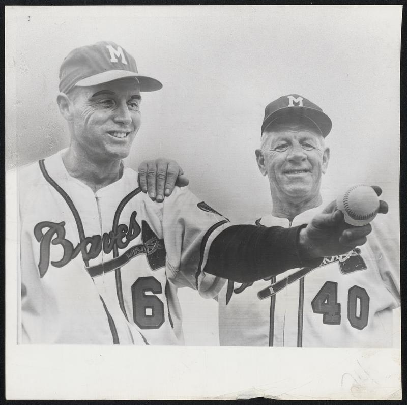 Gene Bearden (left) is shown with Manager Charley Grimm at Braves camp in Bradenton, Fla. The left-hander is trying a comeback to the majors after posting 20 victories last year with San Francisco. He knocked the Red Sox out of intra-city World Series in 1948 when he pitched the Indians to win over Red Sox after teams had ended season tied for first. Cleveland then defeated the Boston Braves in series.