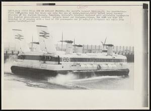 In Trial Run on English Channel-- The world's largest hovercraft, the Mountbatten- class SRN4, moves down the beach and onto the sea at Dover, England, today before trail two-way crossing of the English Channel. Tomorrow, Britain's Princess Margaret will officially inaugurate this regular cross-channel service between Dover and Boulogne, France. The SRN4 can make the crossing in 35 minutes with a load of 250 passengers and 30 cars.