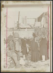 Oak Lawn, Ill. – Nuns Comfort Owner Of Wrecked Home – Mrs. Ruby Houston, left in background, a widow, is comforted by nuns E3967over the wreckage of her home. National guardsman passes.