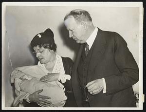 Mayor and Mrs. Mansfield extends Christmas greetings to the youngest and smallest inmate of the Long Island Hospital. The tiny child is seven weeks old and weighs three pounds, two ounces.