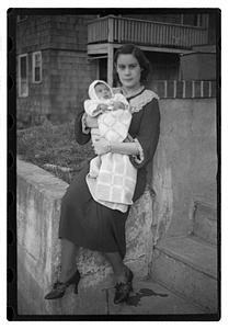 Mercedes Pasarell Sanromá holding a baby