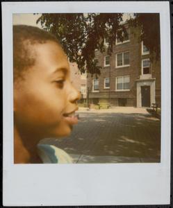 Profile shot of young man in Newtowne Court