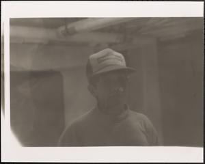 Young man in hat and turtleneck