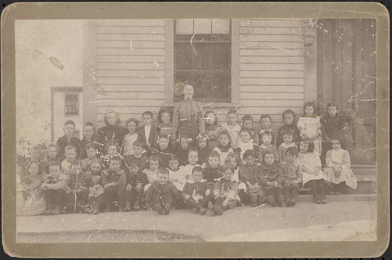 Students with teacher in front of school house - Digital Commonwealth