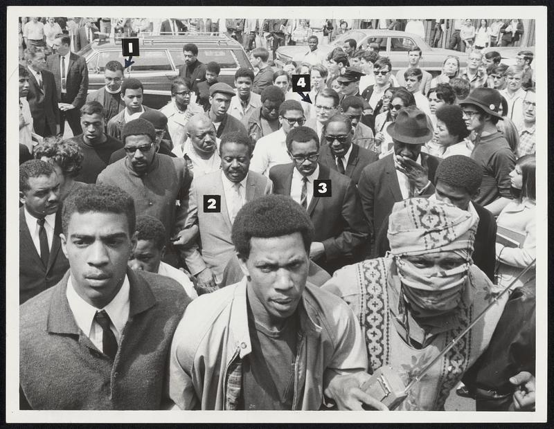 Arriving at Northeastern for address yesterday was the Rev. Dr. Ralph Abernathy (2); center second row. Others in the crowd entering the university are the Rev. James Breeden (1); the Rev. Virgil Wood (3) and Atty. Gen. Elliot Richardson (4).