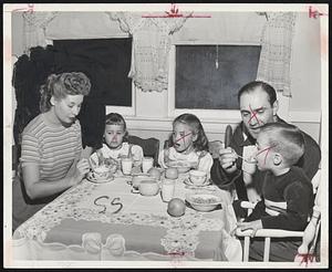 Filling in for Himself-Sibby Sisti, who plugged the hole Stanky left and now may have to move somewhere else, since Heath is hurt, is shown at home filling up Danny Sisti, 3. The rest of the family are his wife, Norine; Elaine, 5, and Rosemary,6.