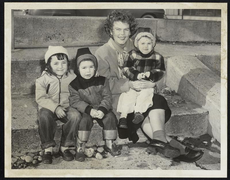 Enjoying spring weather at Revere Beach. L to R. June Robertson 5. Robert Carbone 3. Mrs Hazel Carbone + John Carbone 2. Weather Warm