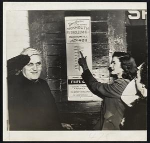 Hot Spot-Jurors walked out of the Monmouth County courthouse at Freehold, N. J., to find thermometer hitting close to 90 degrees. Juror Mrs. Jane Haulenbeek of Belmar points to the mark; court officer Edward A. Borden and another juror, Mrs. Leonard Smith of Interlaken, show effects of the heat.