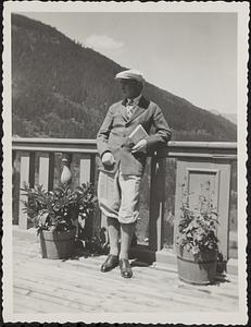 Serge Koussevitzky standing by a railing