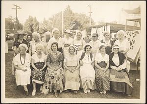 Costumed women, street fair