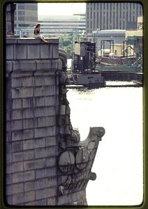 Boston 1981: A woman sits on the parapet of the Longfellow Bridge