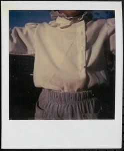 Young person wearing a white shirt