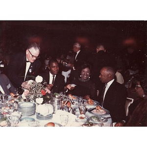 Laymon and Inez Irving Hunter seated at a formal dinner