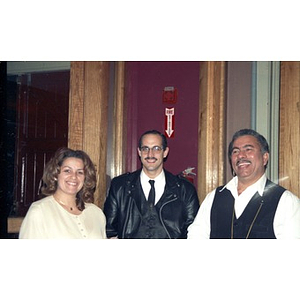 Blanca Cardona and two unidentified men at Inquilinos Boricuas en Acción's Annual Meeting.