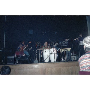 Musicians performing on stage at the Jorge Hernandez Cultural Center.