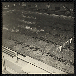 Boys' Club members competing in a swimming race