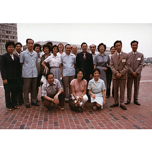 Chinese Progressive Association members posing for a photograph outside at Government Center, Boston