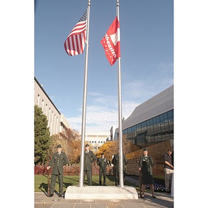 The United States and Northeastern flags at the Veterans Memorial