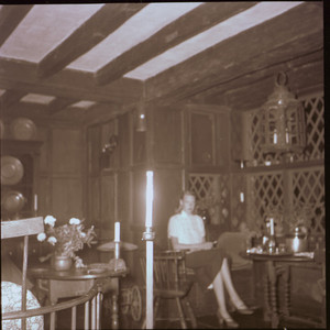 Woman seated in Jacobean Room, Beauport, Sleeper-McCann House, Gloucester, Mass.
