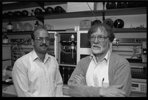 Louis Carpino (right) and unidentified colleague in the lab