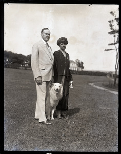 Calvin and Grace Coolidge with their white collie