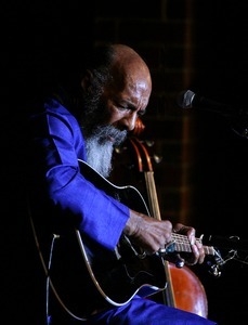 Richie Havens performing on guitar at the Clearwater Festival